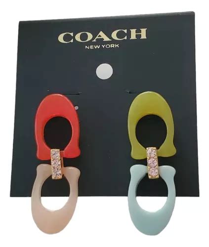 Aretes coach originales .